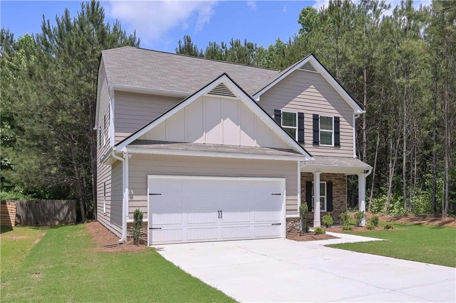 Front exterior of a new home in , Villa Rica, GA, highlighting curb appeal (Image 2).
