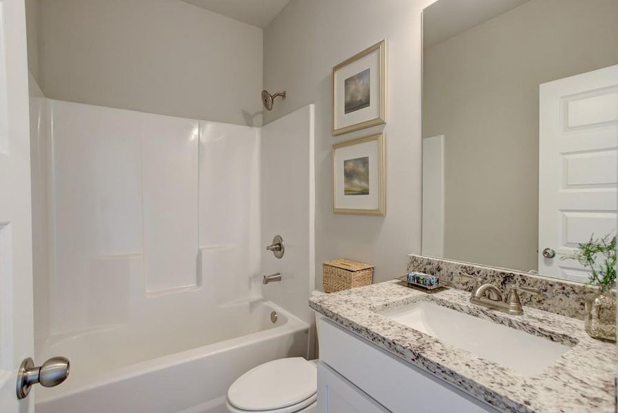 Furnished interior view inside a new home in Sutton's Landing, Statham (Image 18).