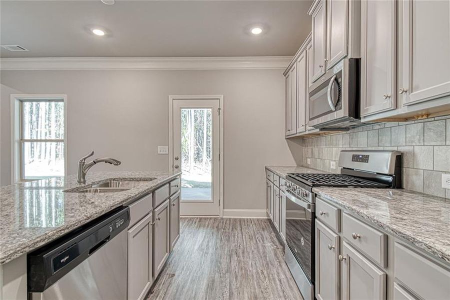 Furnished interior view inside a new home in Enclave at Logan Point, Loganville (Image 7).
