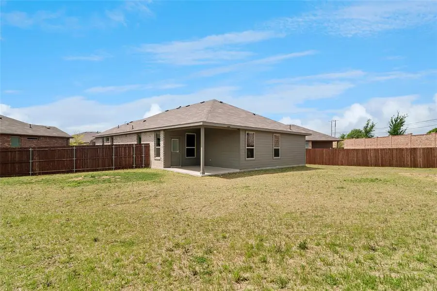 Exterior details and patio area of a home in , Fort Worth (Image 3). Exterior details and patio area of a home in , Fort Worth (Image 3).