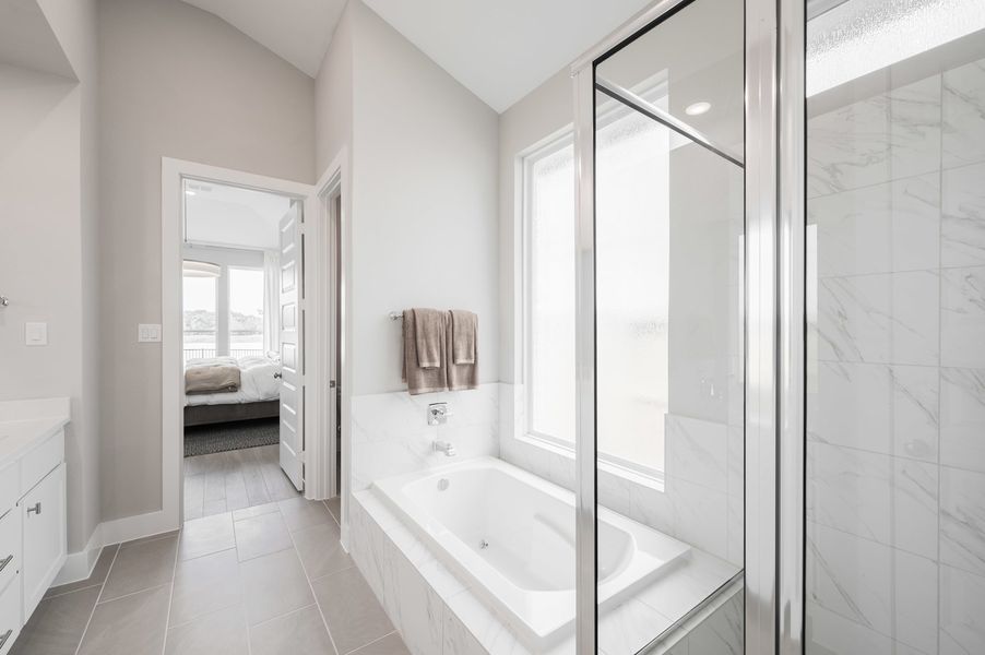 Representative furnished interior of a home built from the Verdin by Tri Pointe Homes in Pecan Ridge, Fulshear (Image 30).