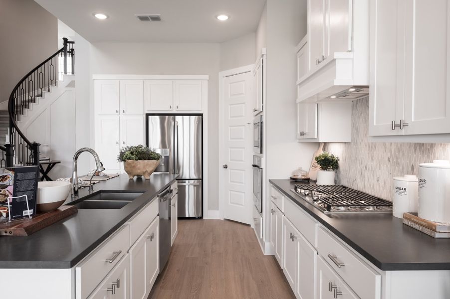 Representative furnished interior of a home built from the Verdin by Tri Pointe Homes in Pecan Ridge, Fulshear (Image 90).