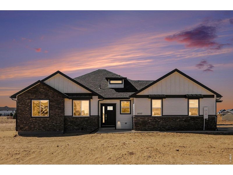 Front exterior of a new home in , Platteville, CO, highlighting curb appeal (Image 22).