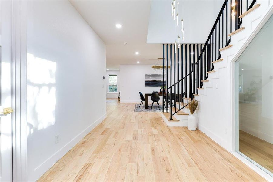 Entrance foyer featuring light hardwood / wood-style flooring