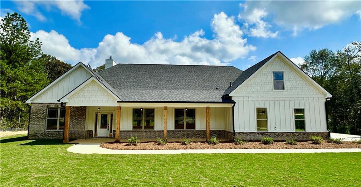 Front exterior of a new home in , Kingston, GA, highlighting curb appeal (Image 1).