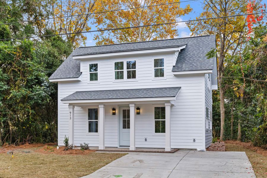 Front exterior of a new home in , Charleston, SC, highlighting curb appeal (Image 18).