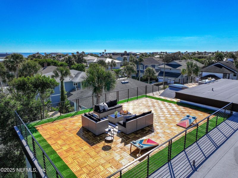 Exterior details and patio area of a home in , Neptune Beach (Image 54).