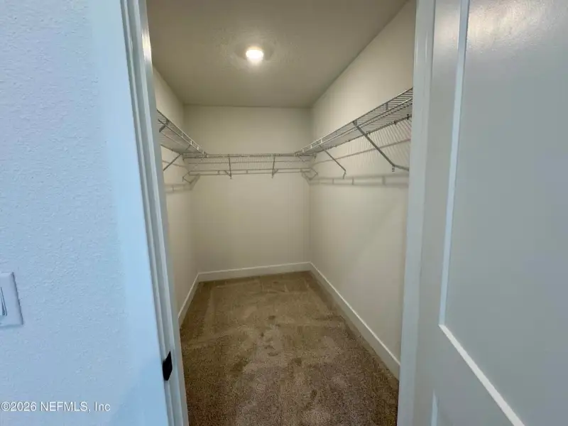 Spacious, unfurnished interior of a new home in Shadow Crest at Rolling Hills, Green Cove Springs (Image 12).