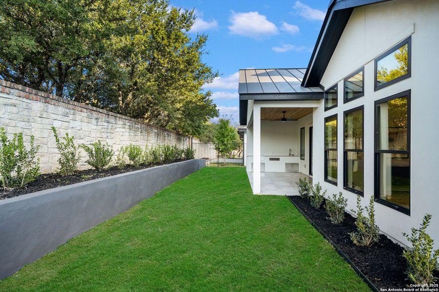 Exterior details and patio area of a home in , San Antonio (Image 25).