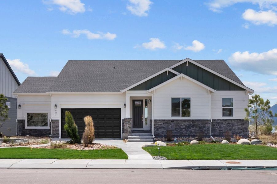 Representative exterior photo of a completed home built from the Tenley by Lokal Homes in Paint Brush Hills, Peyton, CO (Image 26). Representative exterior photo of a completed home built from the Tenley by Lokal Homes in Paint Brush Hills, Peyton, CO (Image 26).