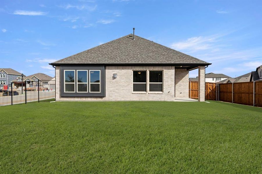Exterior details and patio area of a home in Brookshire at Legacy Hills, Celina (Image 3).