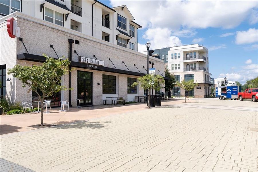 Front exterior of a new home in , Mableton, GA, highlighting curb appeal (Image 22).
