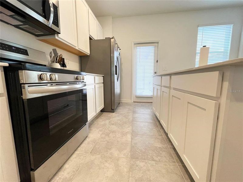 Furnished interior view inside a new home in , Clermont (Image 7).
