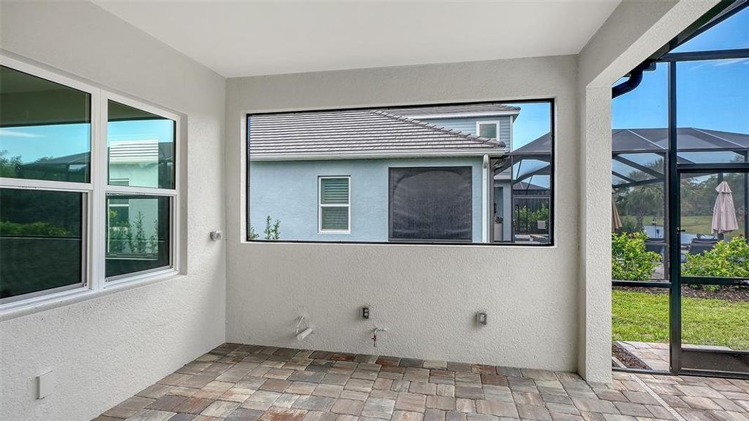 Exterior details and patio area of a home in Grand Park, Sarasota (Image 29). Exterior details and patio area of a home in Grand Park, Sarasota (Image 29).
