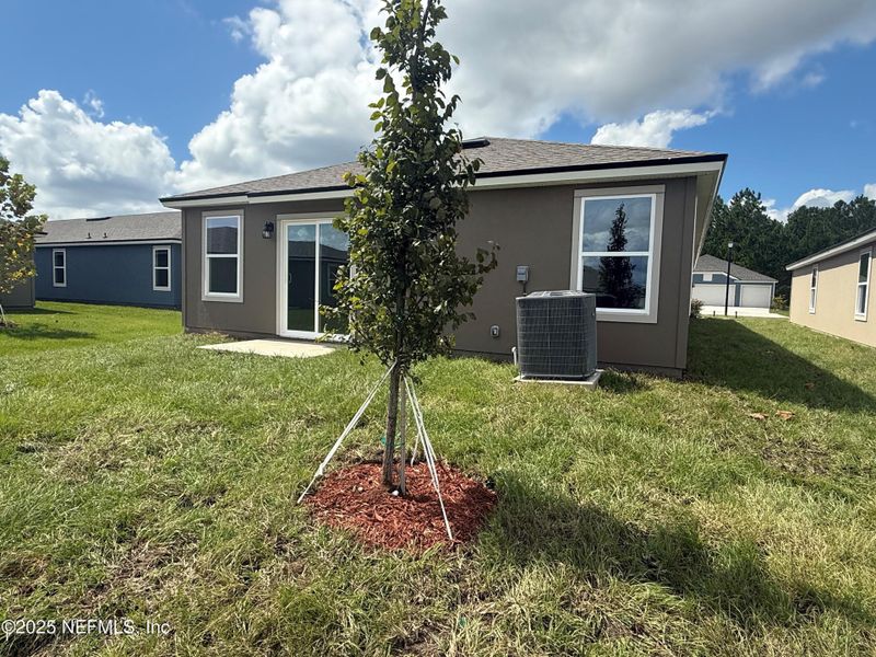Exterior details and patio area of a home in The Arbors, Jacksonville (Image 3). Exterior details and patio area of a home in The Arbors, Jacksonville (Image 3).