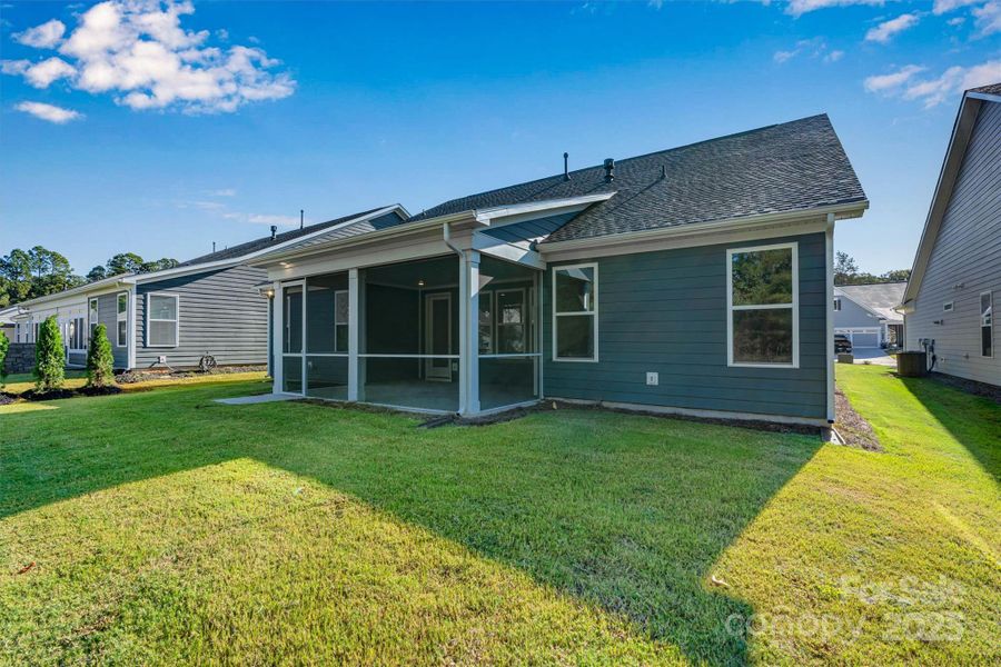 Exterior details and patio area of a home in , Charlotte (Image 3). Exterior details and patio area of a home in , Charlotte (Image 3).