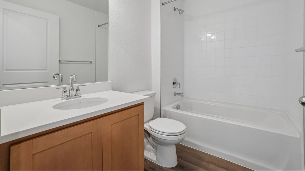 Secondary bathroom with vanity, tub and shower combination, and quality finishes. Secondary bathroom with vanity, tub and shower combination, and quality finishes.