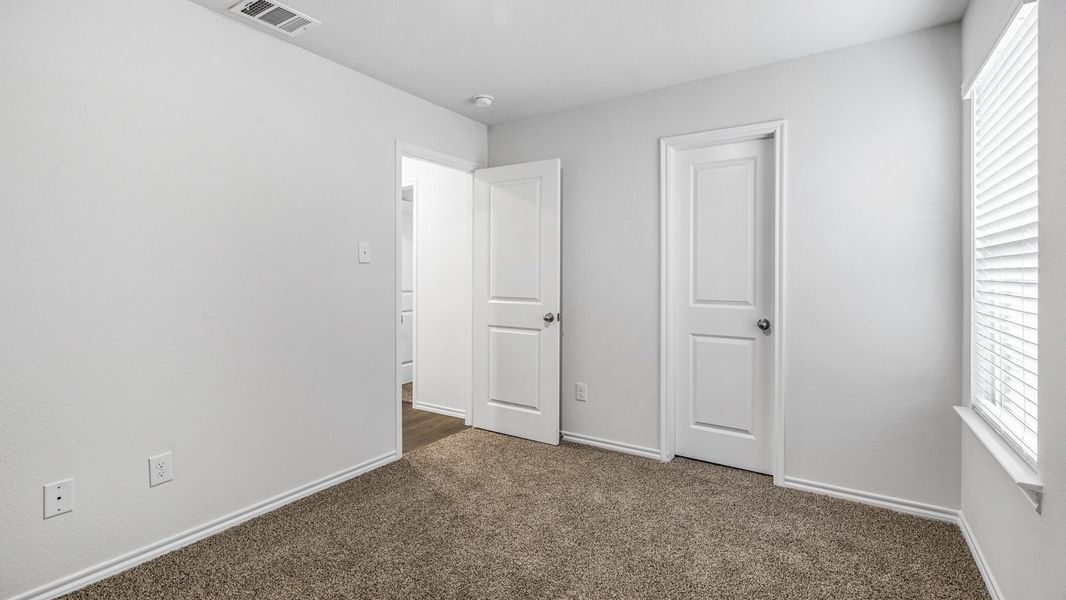 Spacious, unfurnished interior of a new home in Stonewyck Farms, Ennis (Image 18).