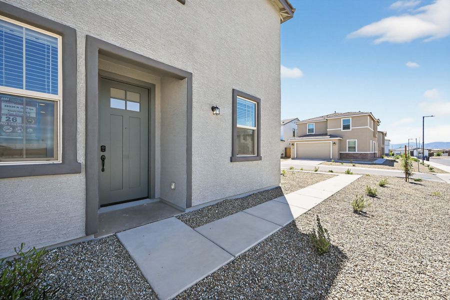 Exterior details and patio area of a home in Artisan at Asante, Surprise (Image 22).