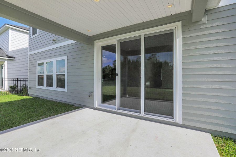 Exterior details and patio area of a home in Hyland Trail, Green Cove Springs (Image 32).
