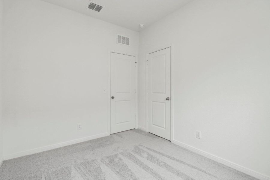Spacious, unfurnished interior of a new home in Pender Woods at Cane Bay, Summerville (Image 8).