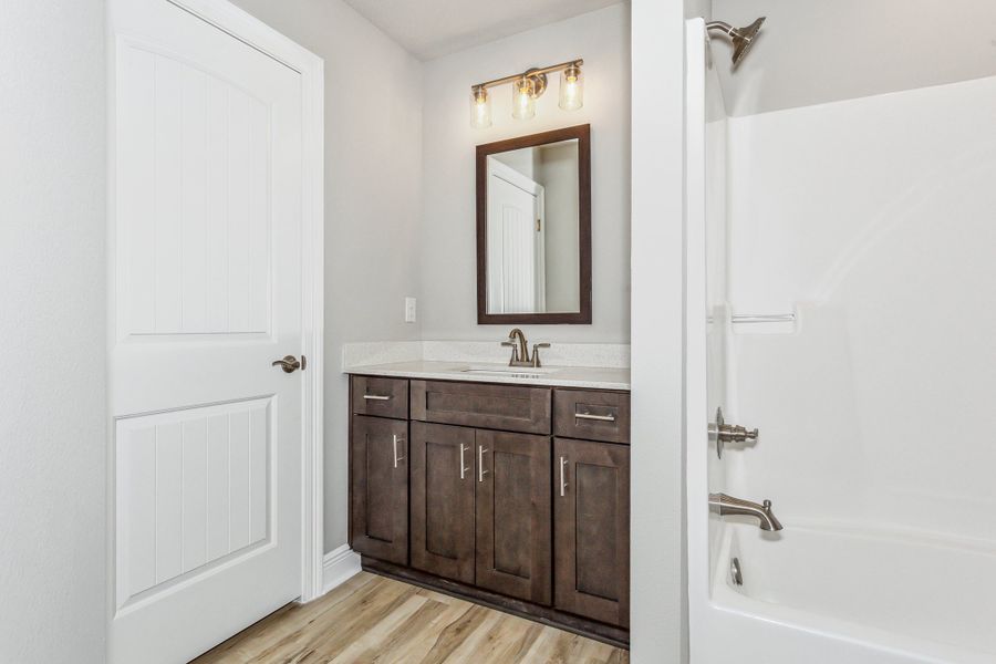 Representative furnished interior of a home built from the The Turquoise by Herbst Homes in Walther Reserve, Milton (Image 95).