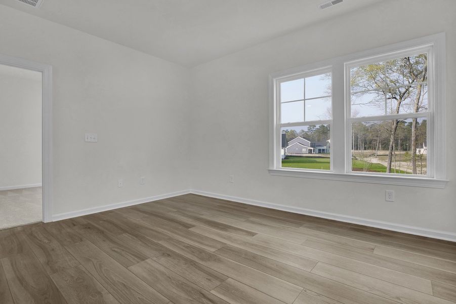Spacious, unfurnished interior of a new home in Indigo at Abbey Preserve, Wilmington (Image 25).