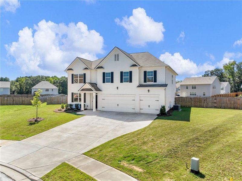 Front exterior of a new home in , Braselton, GA, highlighting curb appeal (Image 25). Front exterior of a new home in , Braselton, GA, highlighting curb appeal (Image 25).