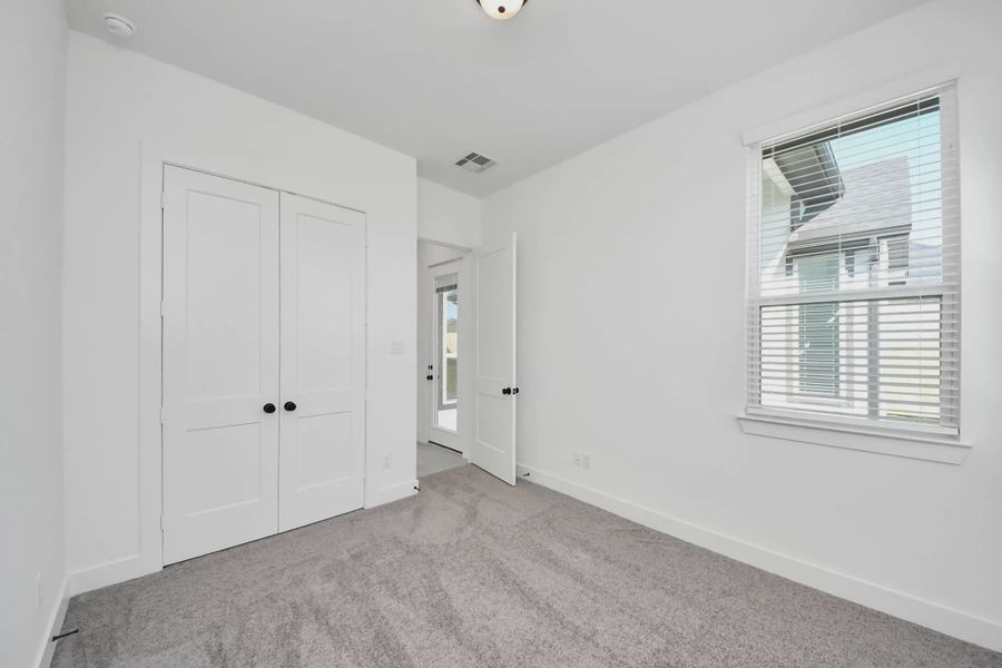 Representative unfurnished interior of a home built from the Summerton by Chesmar Homes in Meridiana 50's and 60's, Manvel (Image 60).