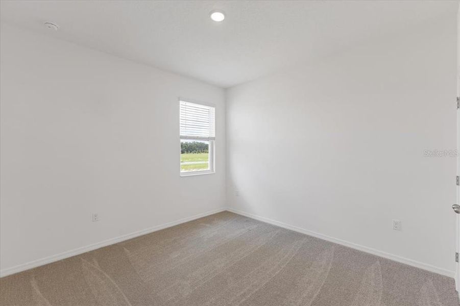 Spacious, unfurnished interior of a new home in Highfield at Twisted Oaks, Wildwood (Image 9).