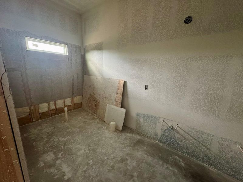 Master bathroom has a walk-in shower and dual vanity