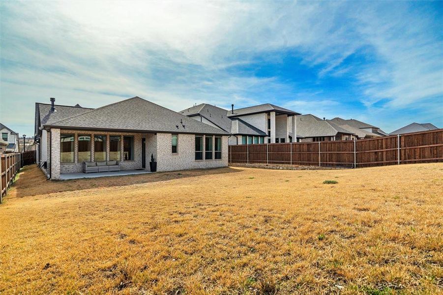 Exterior details and patio area of a home in Walsh, Fort Worth (Image 27).