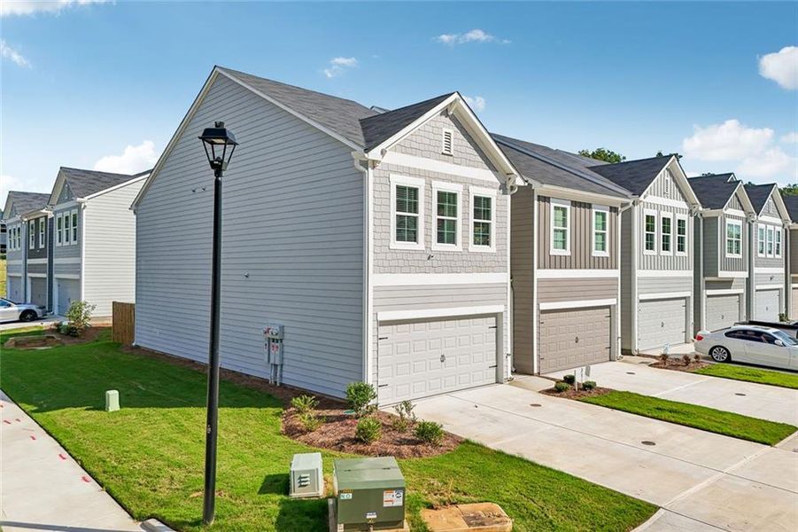 Front exterior of a new home in , Decatur, GA, highlighting curb appeal (Image 26).