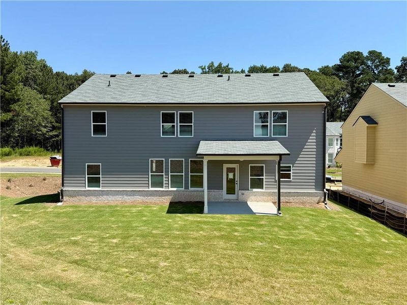 Front exterior of a new home in , Buford, GA, highlighting curb appeal (Image 13).