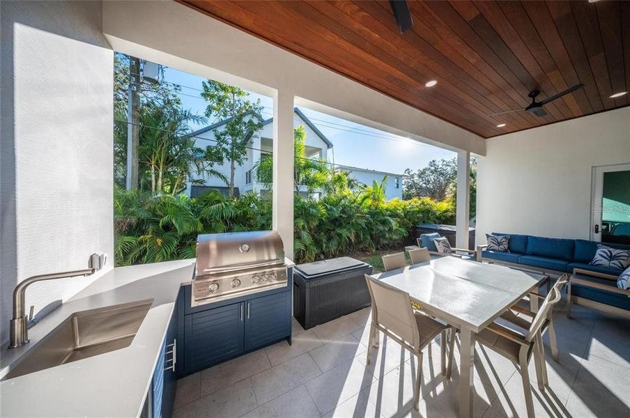 Exterior details and patio area of a home in , Sarasota (Image 26).