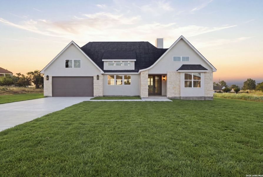 Front exterior of a new home in , Bandera, TX, highlighting curb appeal (Image 1). Front exterior of a new home in , Bandera, TX, highlighting curb appeal (Image 1).