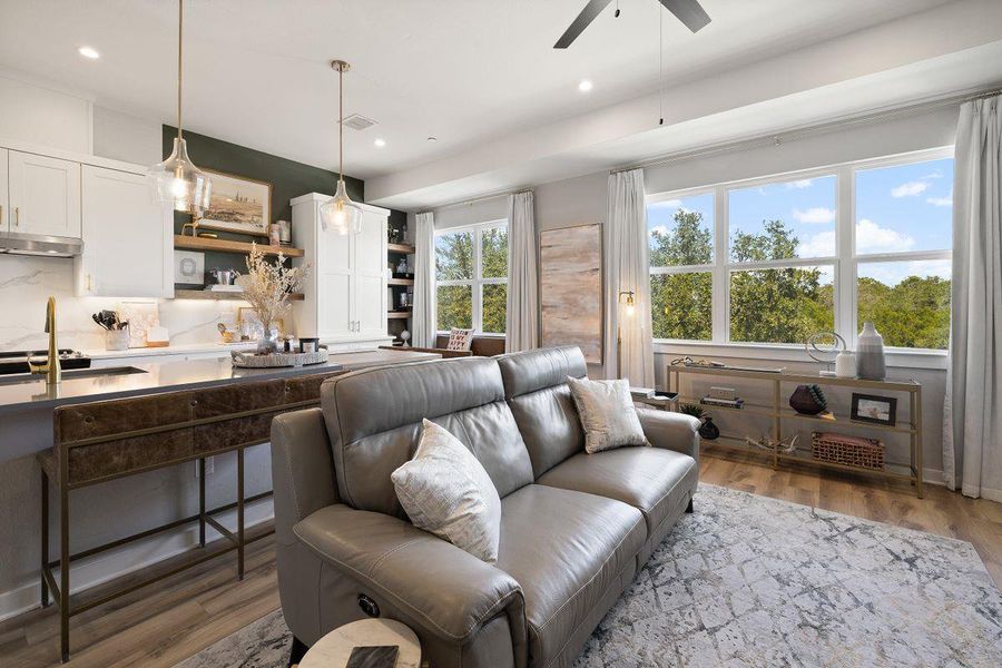 The living area opens to the designer kitchen. Look at all the windows! The living area opens to the designer kitchen. Look at all the windows!