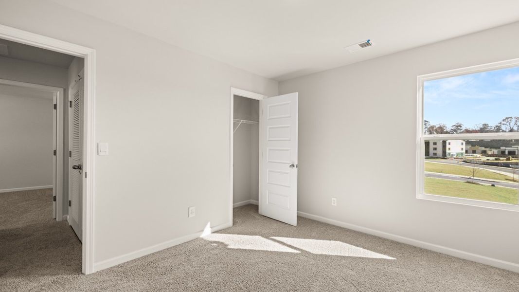 Representative unfurnished interior of a home built from the Plan by D.R. Horton in WillowBrook, Winder (Image 19).