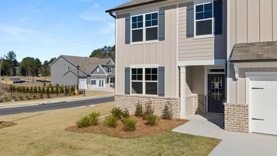 Exterior details and patio area of a home in Fairway 17 at Mirror Lake, Villa Rica (Image 3).