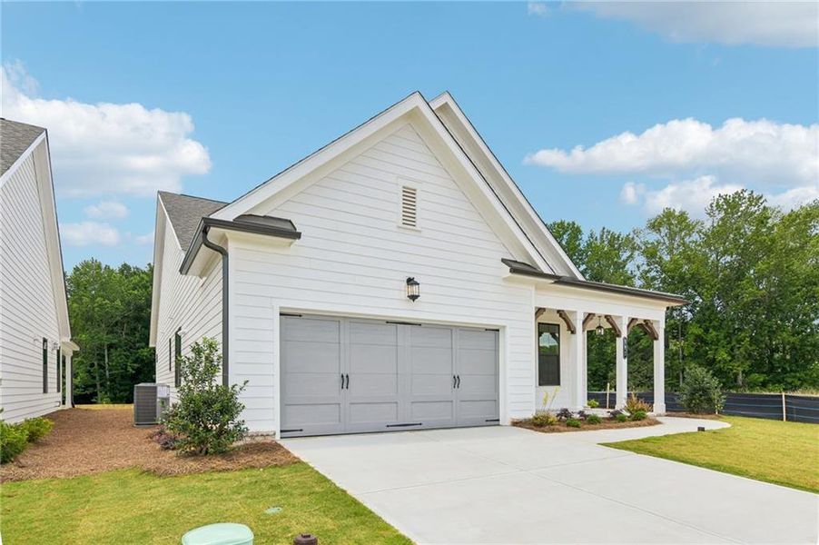 Front exterior of a new home in Aberdeen, Hoschton, GA, highlighting curb appeal (Image 2). Front exterior of a new home in Aberdeen, Hoschton, GA, highlighting curb appeal (Image 2).