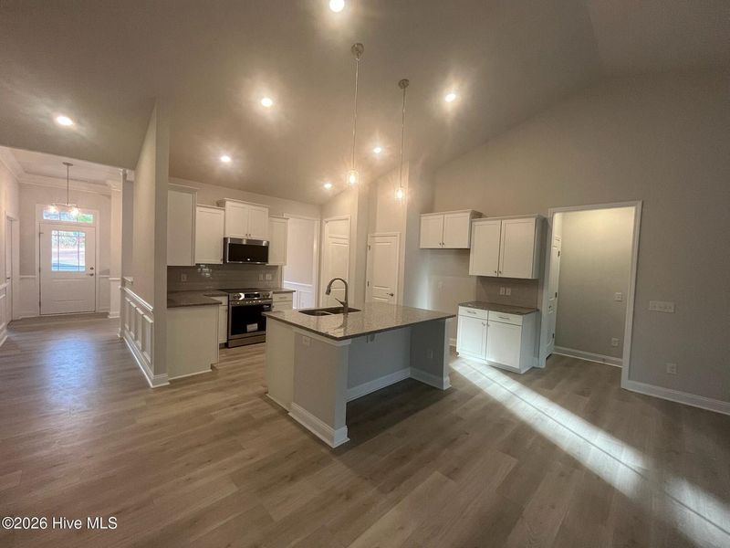 Furnished interior view inside a new home in Palmetto Creek, Bolivia (Image 9).