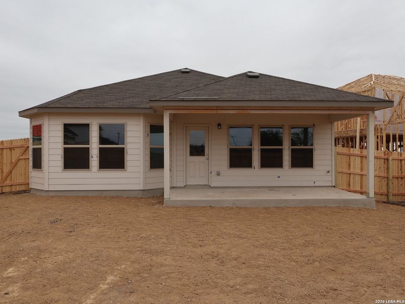 Exterior details and patio area of a home in Verano Farms, Von Ormy (Image 20).