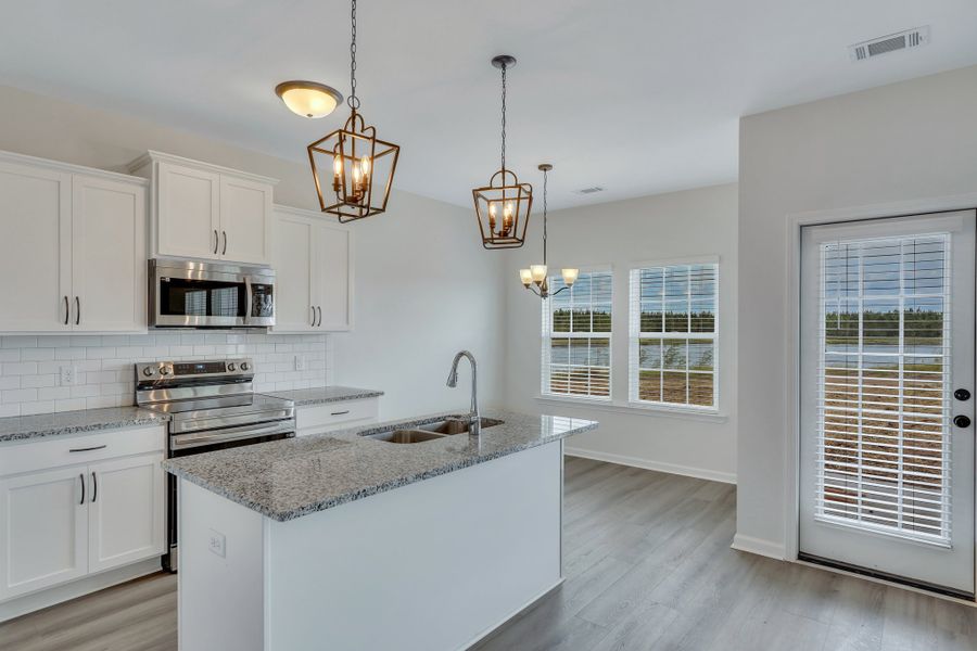 Representative furnished interior of a home built from the The Norman by RTS Homes in Doctor's Creek, Ludowici (Image 10).