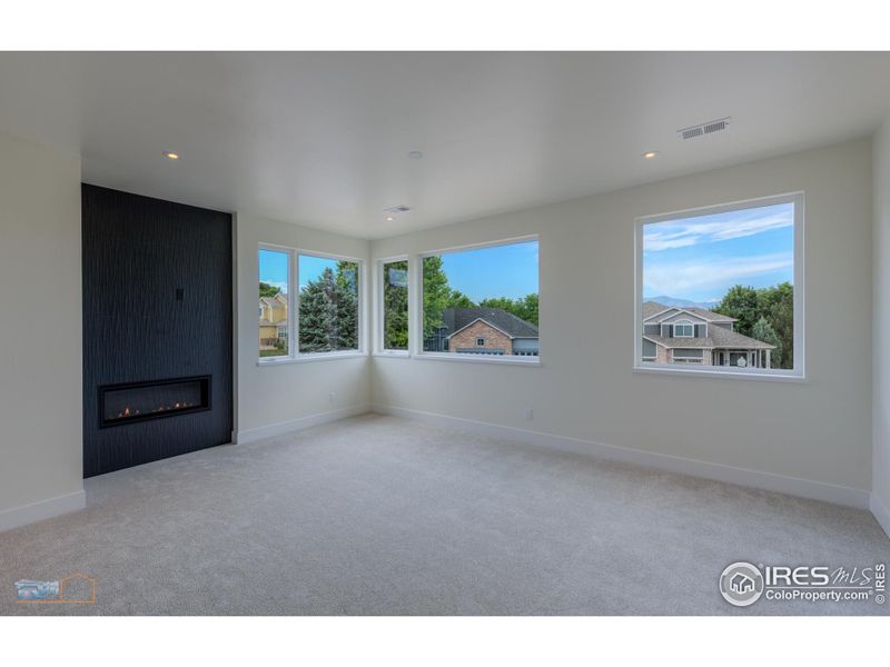 Primary Bedroom With Excellent Foothill And Back Range Views And Fireplace