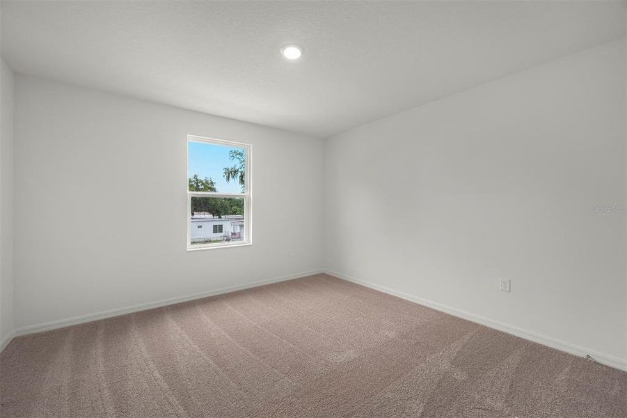 Spacious, unfurnished interior of a new home in Tula Parc, Astatula (Image 21).
