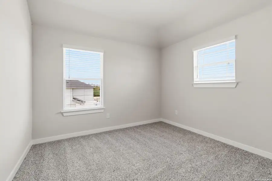 Spacious, unfurnished interior of a new home in Hunters Ranch, San Antonio (Image 20).