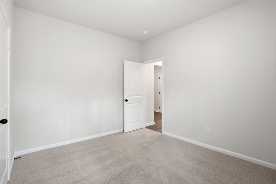 Representative unfurnished interior of a home built from the Magnolia Select M by McGuinn Homes in Broadway Lake, Anderson (Image 19).