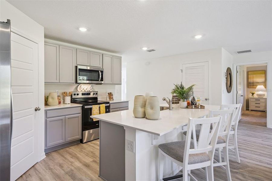 Furnished interior view inside a new home in Magnolia Pointe, Umatilla (Image 7).