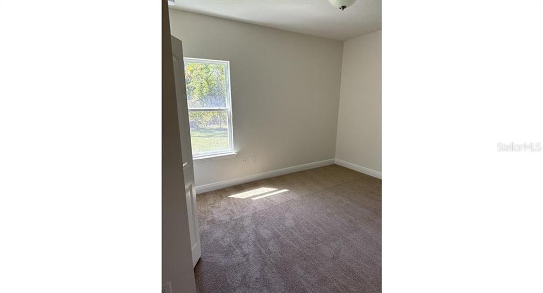 Spacious, unfurnished interior of a new home in , North Port (Image 10).