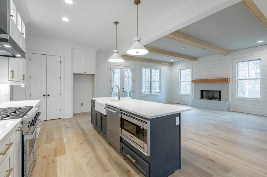 Representative furnished interior of a home built from the Carolina A by Riverstone Construction, LLC in Jasper Highlands, Guild (Image 9).